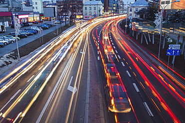 Poland, Subcarpathia, Rzeszow, Evening traffic in city