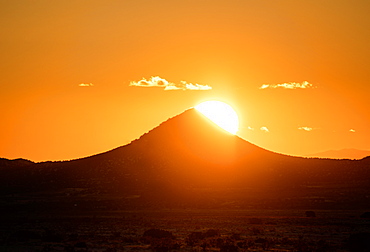 Usa, New Mexico, Santa Fe, El Dorado, Sun setting over hills