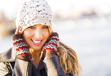 Portrait of bundled woman, USA, New York City, Brooklyn, Williamsburg