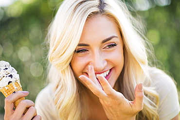Portrait of teenage girl (16-17) eating ice cream