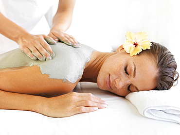 Woman receiving spa treatment