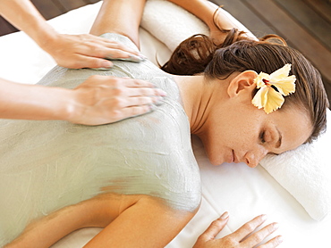 Woman receiving spa treatment