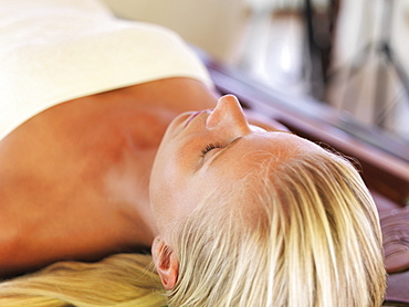 Woman relaxing in spa