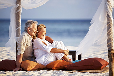 Portrait of couple on beach, Thailand 