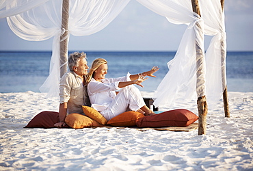 Portrait of couple on beach, Thailand 