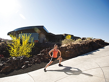 Young woman stretching, USA, Utah, St. George