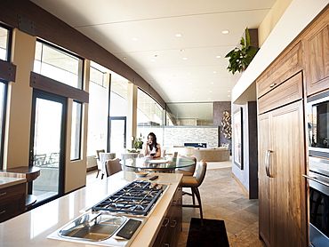 Woman in home interior, USA, Utah, St George