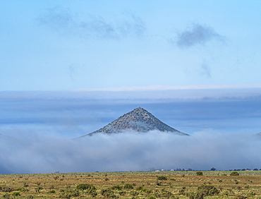 USA, New Mexico, Santa Fe, Clouds covering landscape in Cerrillos Hills State Park