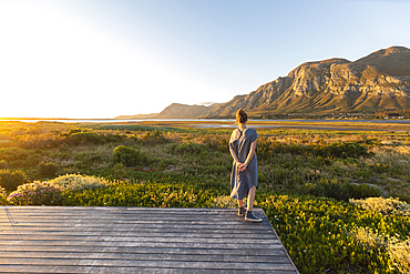 South Africa , Stanford, Girl (16-17) looking at mountains