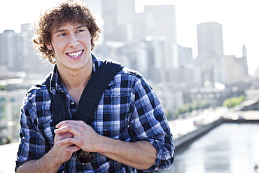 USA, Washington, Seattle, Man with skyline in background