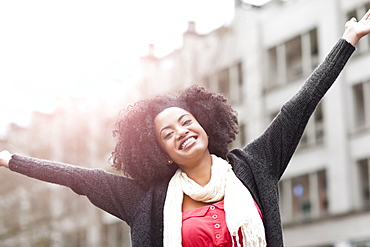 USA, Washington State, Seattle, Portrait of enthusiastic young woman