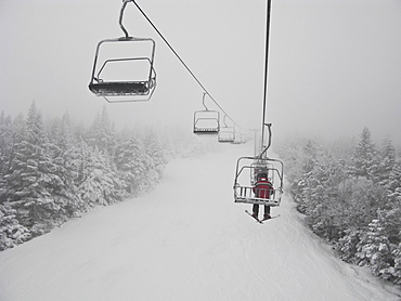 Skier on chair lift