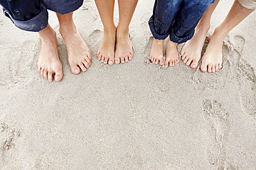 Family at beach, low section