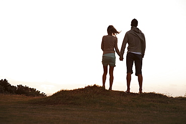 Couple holding hands