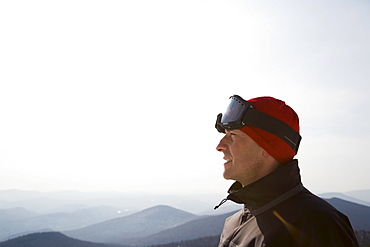 Skier at top of ski hill