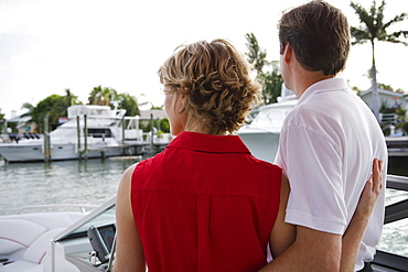 Couple hugging on boat