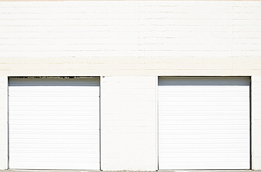 Close-up shot of closed roller doors of warehouse