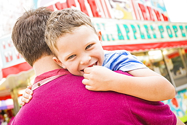 Father and son (4-5) in amusement park, USA, Utah, Salt Lake City 