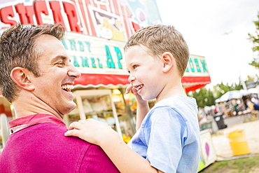 Father and son (4-5) in amusement park, USA, Utah, Salt Lake City 