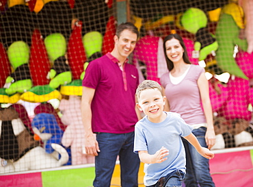 Happy Family and son (4-5) having fun in amusement park, USA, Utah, Salt Lake City 