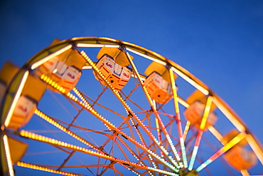 Ferris wheel in amusement park at dusk, USA, Utah, Salt Lake City 