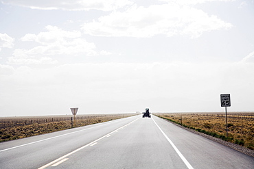 Car on open rural highway, Colorado, USA