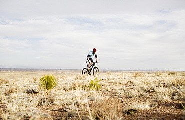 Male mountain biker on trail, Colorado, USA