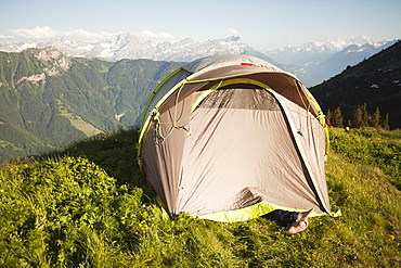 Switzerland, Leysin, Tent pitched on Alpine meadow, Switzerland, Leysin