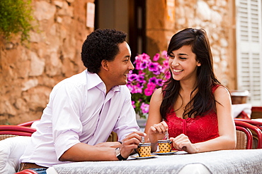 France, Cassis, Couple sitting in cafe drinking coffee, France, Cassis