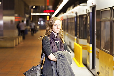 USA, California, Los Angeles, Woman standing on subway station