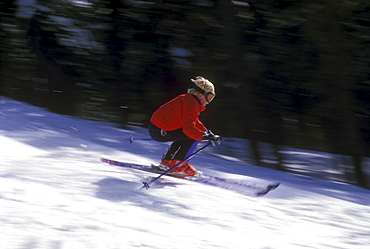 USA, California, Lake Tahoe, Boy (10-11) skiing down slope