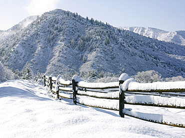 USA, Colorado, snowy ranch with pen