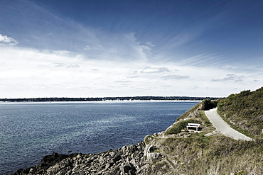 France, Brittany, Finistere Department, Bench, coastline and ocean