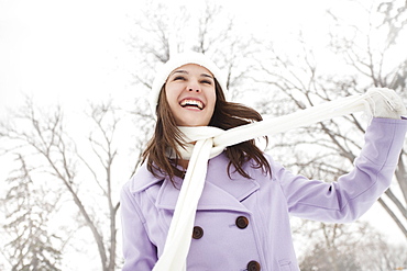 USA, Utah, Lehi, Young woman wearing winter coat outdoors