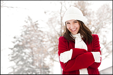 USA, Utah, Lehi, Portrait of young woman shivering in snow