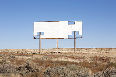 USA, Arizona, Winslow, Blank billboard against blue sky