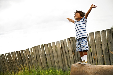 Boy (2-3) playing with toy aeroplane