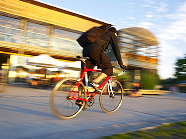 Cyclist riding bike on Vancouver street