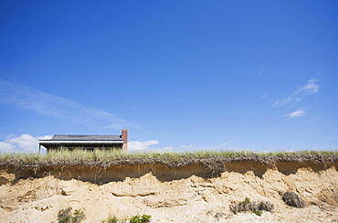 Dunes and roof in the background