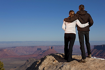 Couple looking at canyon