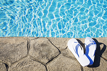 Flip flops by the pool