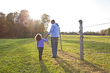 Father and daughter walking