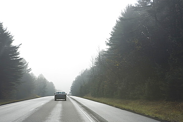 Car driving on rural road