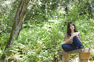 Young female in forest