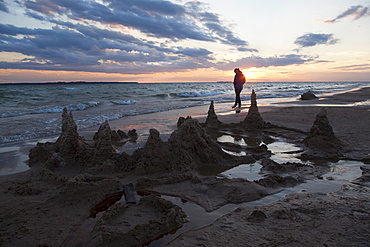 Beaver Island, Lonely person walking on beach during sunset, Beaver Island, Michigan, USA