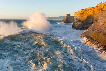 Waves crushing over cliffs, Pacific City, Oregon, USA