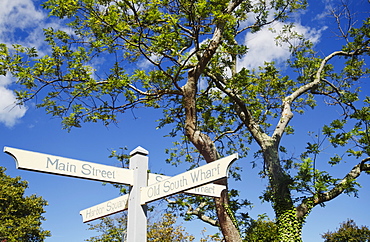 Low angle view of direction signs, Nantucket, Massachusetts