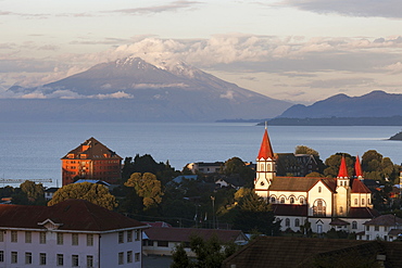 Town skyline with volcano in background, Chile, Lake District, Puerto Varas 