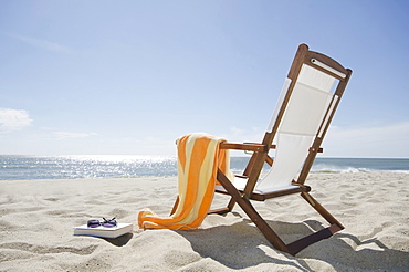 Sun chair on sandy beach