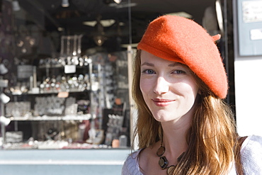 France, Pas-de-Calais, Escalles, Portrait of young woman in red beret, France, Pas-de-Calais, Escalles